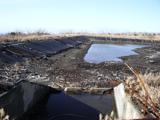 被災後の笠地貯水池 画像